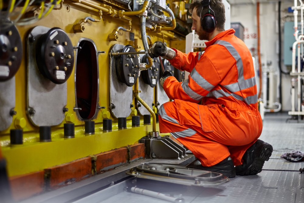 Engineer,Manually,Removes,Inspection,Covers,To,Check,Condition,Of,Main